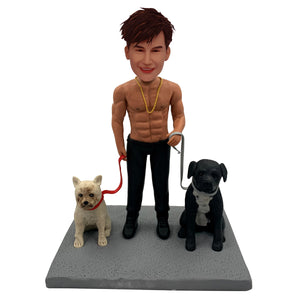 Two Puppies and a Well-built Owner Bobblehead